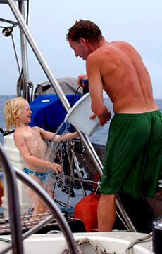 Jamie helps Siobhan with a bath underway: saltwater cleaning followed